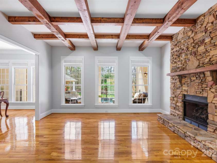 2017 Colorado Court, Lancaster, SC 29720.  MLS# CAR4239549, YatesRealty ID 12240. Den/family room: overlooks back terrace; coffered ceilings.