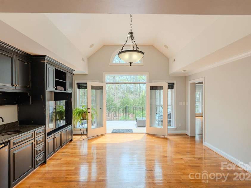 2017 Colorado Court, Lancaster, SC 29720.  MLS# CAR4239549, YatesRealty ID 12240. Entertainment Area-upper level; french doors open to upper terrace.