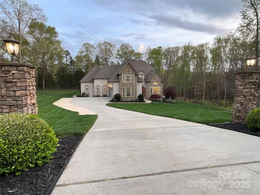 2017 Colorado Court, Lancaster, SC 29720.  MLS# CAR4239549, YatesRealty ID 12240. Welcoming Entrance With Dusk Lighting