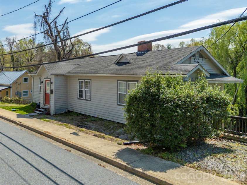 120 Howard Street, Tryon, NC 28782.  MLS# CAR4362646, YatesRealty ID 12246. 