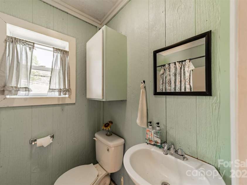 228 Red Dog Drive, Mooresville, NC 28115.  MLS# CAR4245955, YatesRealty ID 12253. A full bathroom in the barn, is gold in the horse world