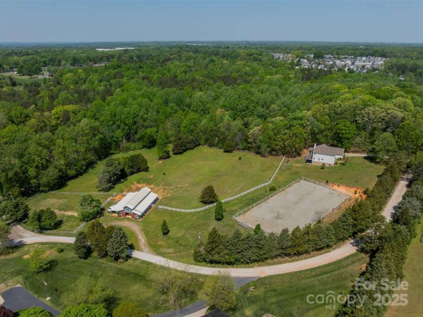 228 Red Dog Drive, Mooresville, NC 28115.  MLS# CAR4245955, YatesRealty ID 12253. Great Oak Farm on a private dead end road offers privacy and convenience to downtown Mooresville
