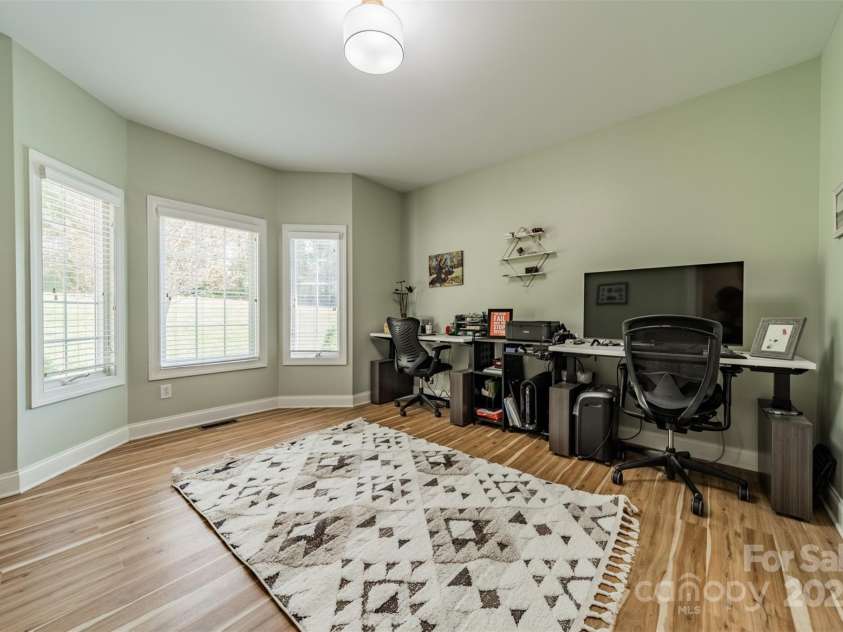 228 Red Dog Drive, Mooresville, NC 28115.  MLS# CAR4245955, YatesRealty ID 12253. Office with large bay window, also just off the foyer, yet also has opening to the primary suite