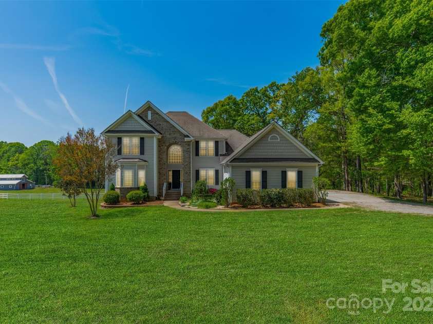 228 Red Dog Drive, Mooresville, NC 28115.  MLS# CAR4245955, YatesRealty ID 12253. Welcome to Great Oak Farm, a name in honor of the 300+/- White Oak tree along the trails and down by the creek on this beautiful 9.32 acre farm.