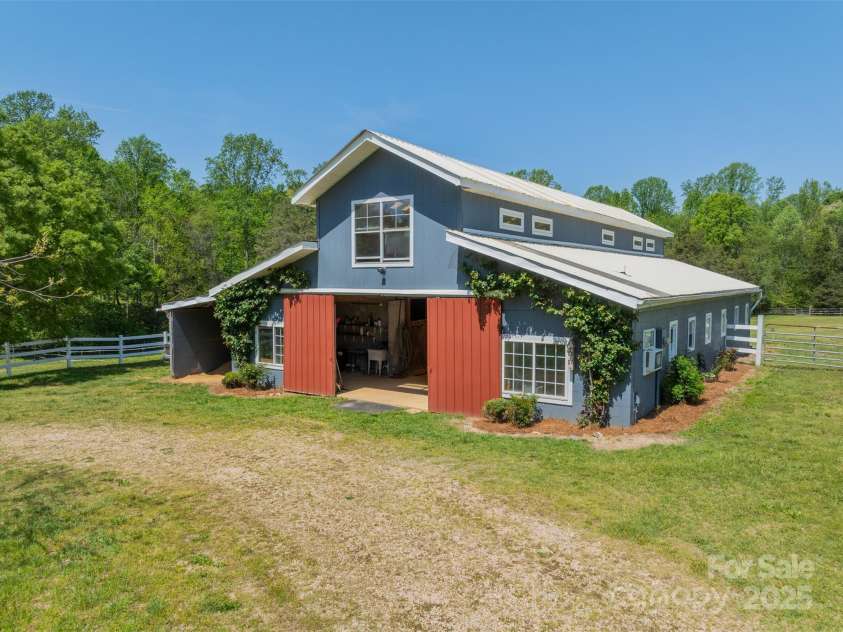 228 Red Dog Drive, Mooresville, NC 28115.  MLS# CAR4245955, YatesRealty ID 12253. Whether a hobby farm or equestrian estate, everything you need is here