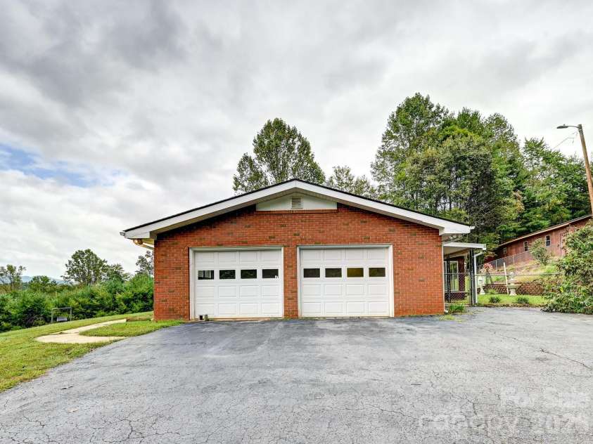 651 Case Cove Road, Candler, NC 28715.  MLS# CAR4335473, YatesRealty ID 12253. 