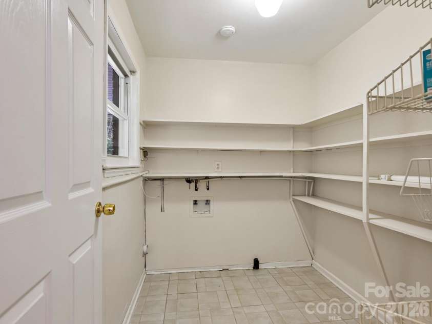 651 Case Cove Road, Candler, NC 28715.  MLS# CAR4335473, YatesRealty ID 12253. Laundry on main