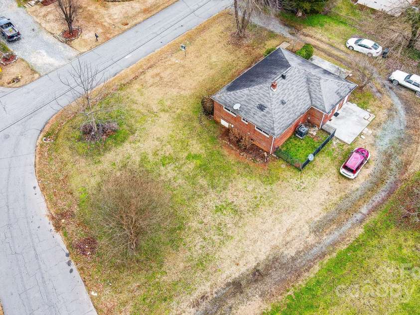 2504 Juniper Drive, Charlotte, NC 28269.  MLS# CAR4209473, YatesRealty ID 12257. Aerial corner lot view