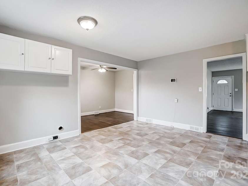 2504 Juniper Drive, Charlotte, NC 28269.  MLS# CAR4209473, YatesRealty ID 12257. Breakfast and laundry area