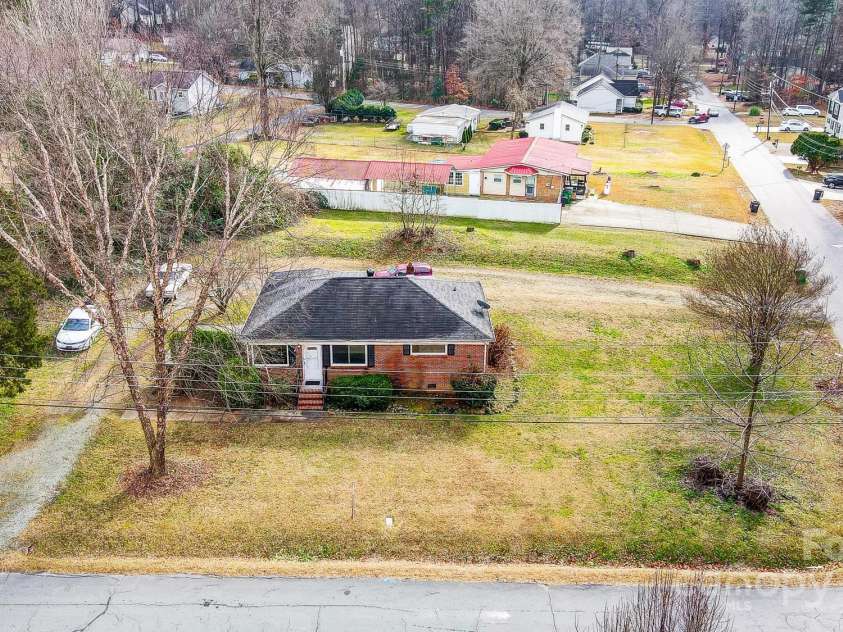 2504 Juniper Drive, Charlotte, NC 28269.  MLS# CAR4209473, YatesRealty ID 12257. Front aerial corner lot view