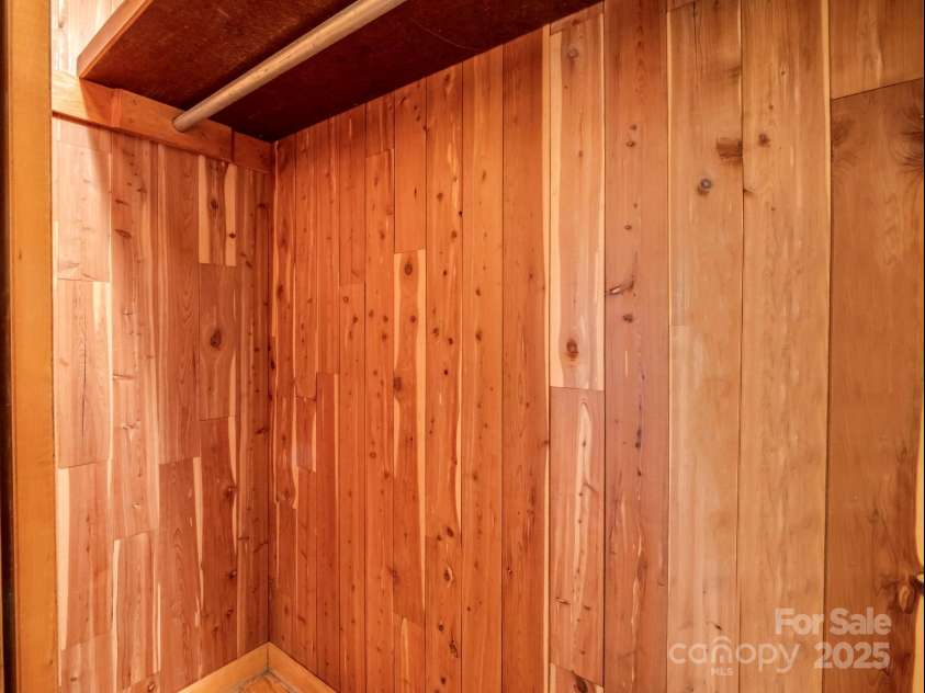 14 Monte Vista Place, Candler, NC 28715.  MLS# CAR4281379, YatesRealty ID 1226. Cedar paneling lined closet