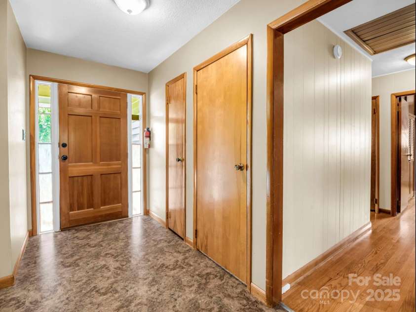 14 Monte Vista Place, Candler, NC 28715.  MLS# CAR4281379, YatesRealty ID 1226. Entry way - solid wood front door
