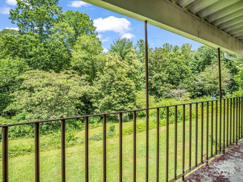 14 Monte Vista Place, Candler, NC 28715.  MLS# CAR4281379, YatesRealty ID 1226. Lovely back porch w/views