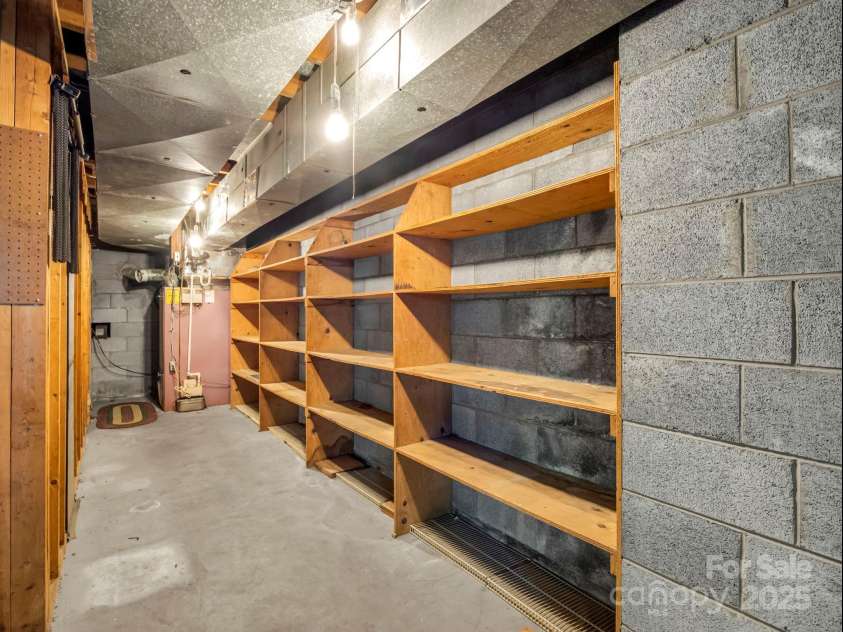 14 Monte Vista Place, Candler, NC 28715.  MLS# CAR4281379, YatesRealty ID 1226. Multiple storage w/shelving 
