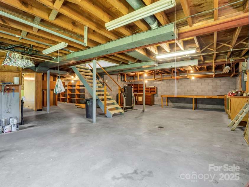 14 Monte Vista Place, Candler, NC 28715.  MLS# CAR4281379, YatesRealty ID 1226. Workshop and storage area