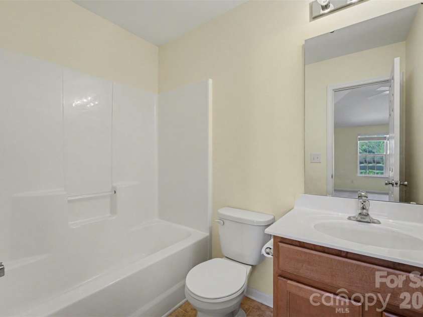 1604 Swan Drive, Charlotte, NC 28216.  MLS# CAR4358962, YatesRealty ID 12261. Bathroom upper level