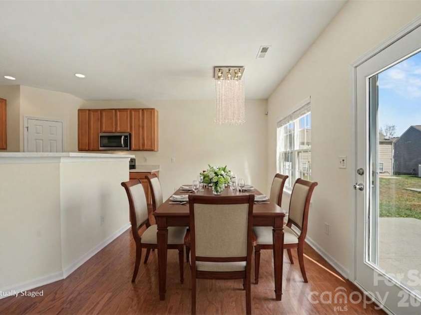 1604 Swan Drive, Charlotte, NC 28216.  MLS# CAR4358962, YatesRealty ID 12261. Breakfast area with virtual staging