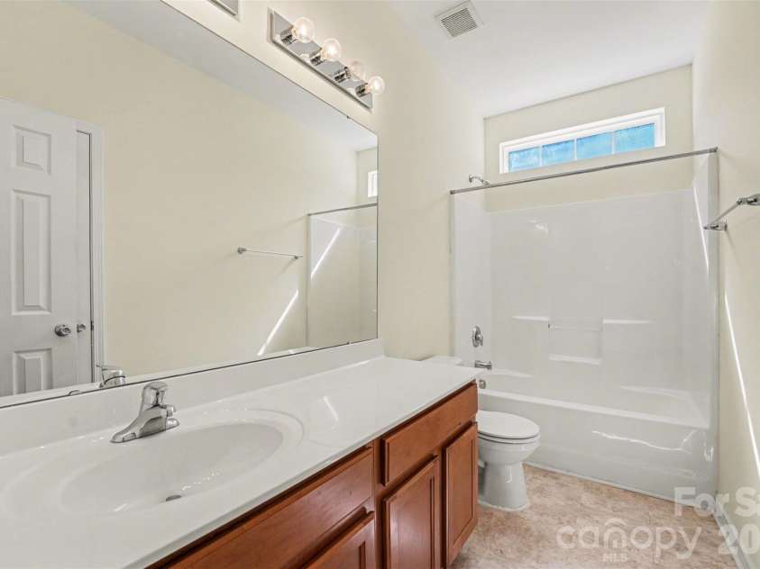 1604 Swan Drive, Charlotte, NC 28216.  MLS# CAR4358962, YatesRealty ID 12261. Hall Bathroom