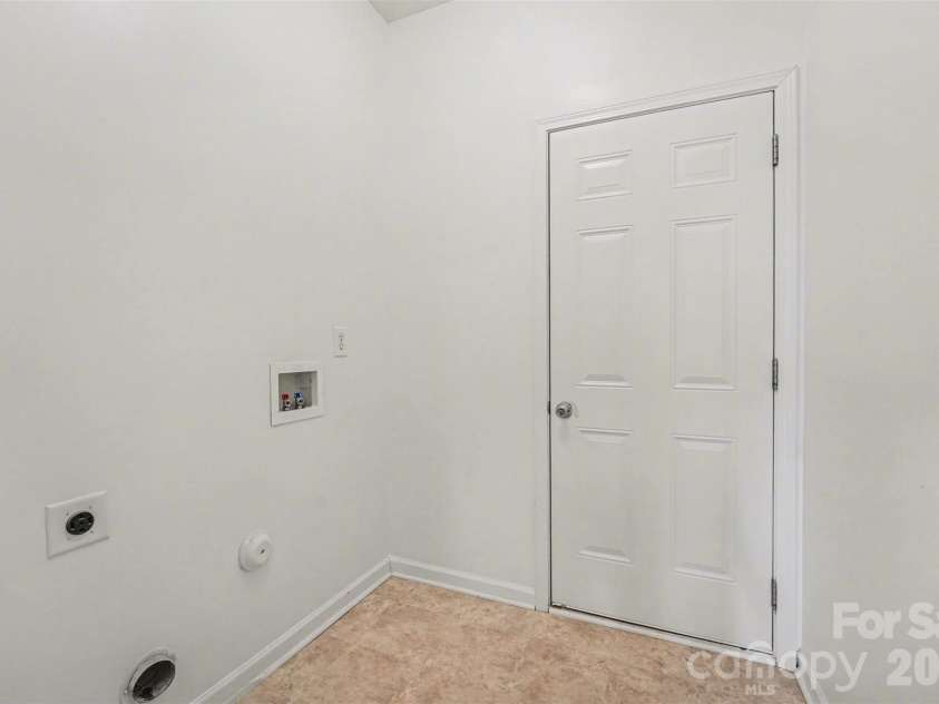1604 Swan Drive, Charlotte, NC 28216.  MLS# CAR4358962, YatesRealty ID 12261. Laundry room main floor 