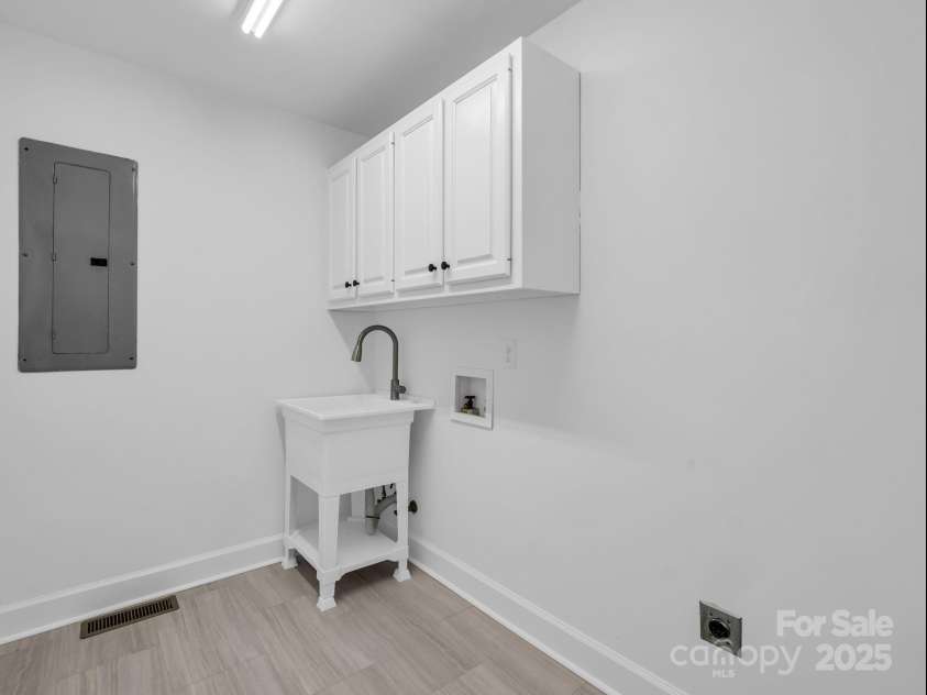 303 Fairforest Drive, Rutherfordton, NC 28139.  MLS# CAR4324733, YatesRealty ID 12262. Laundry Room