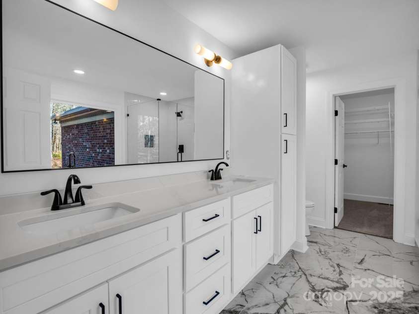 303 Fairforest Drive, Rutherfordton, NC 28139.  MLS# CAR4324733, YatesRealty ID 12262. Primary Bathroom