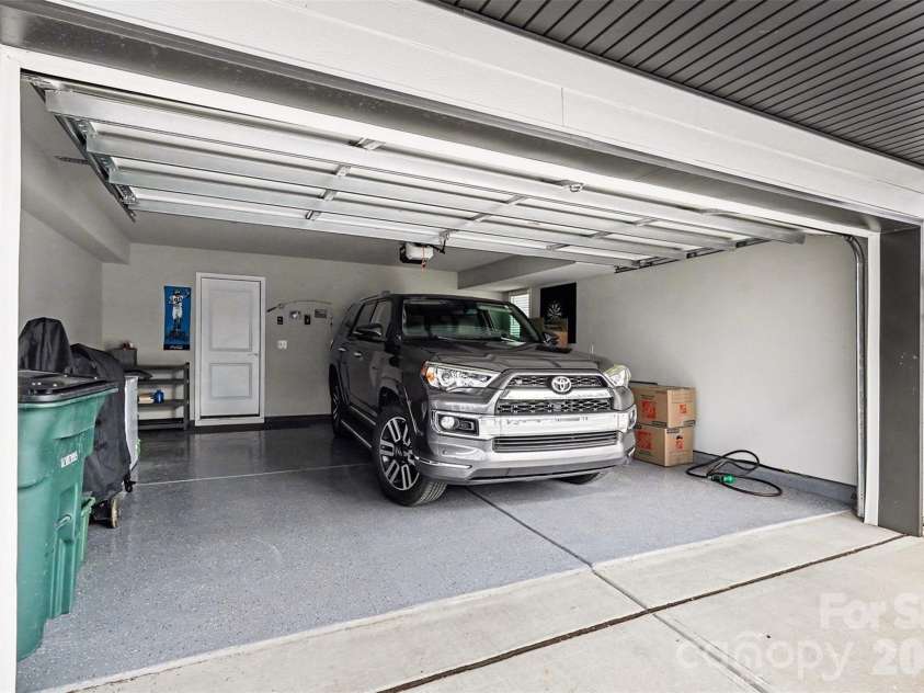 7017 Running Spring Drive, Charlotte, NC 28205.  MLS# CAR4346038, YatesRealty ID 12263. 4 Runner can fit in garage