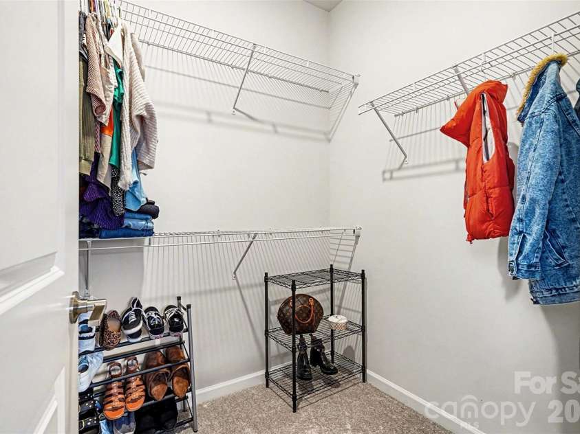 7017 Running Spring Drive, Charlotte, NC 28205.  MLS# CAR4346038, YatesRealty ID 12263. Walk in closet in primary