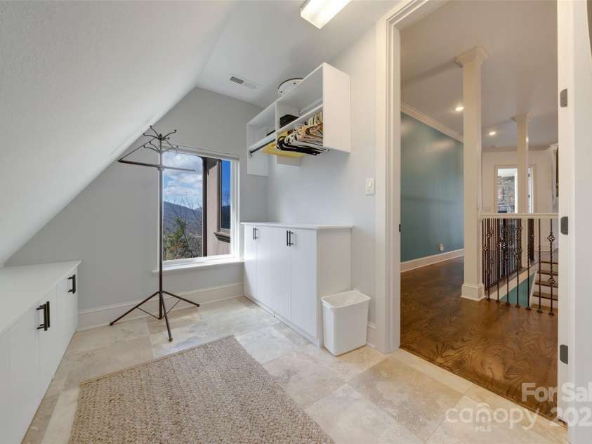 56 Chimney Crest Drive, Asheville, NC 28806.  MLS# CAR4235691, YatesRealty ID 12268. Laundry area