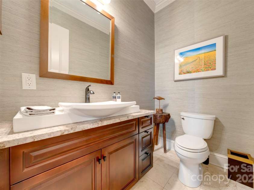 56 Chimney Crest Drive, Asheville, NC 28806.  MLS# CAR4235691, YatesRealty ID 12268. Main level half bath