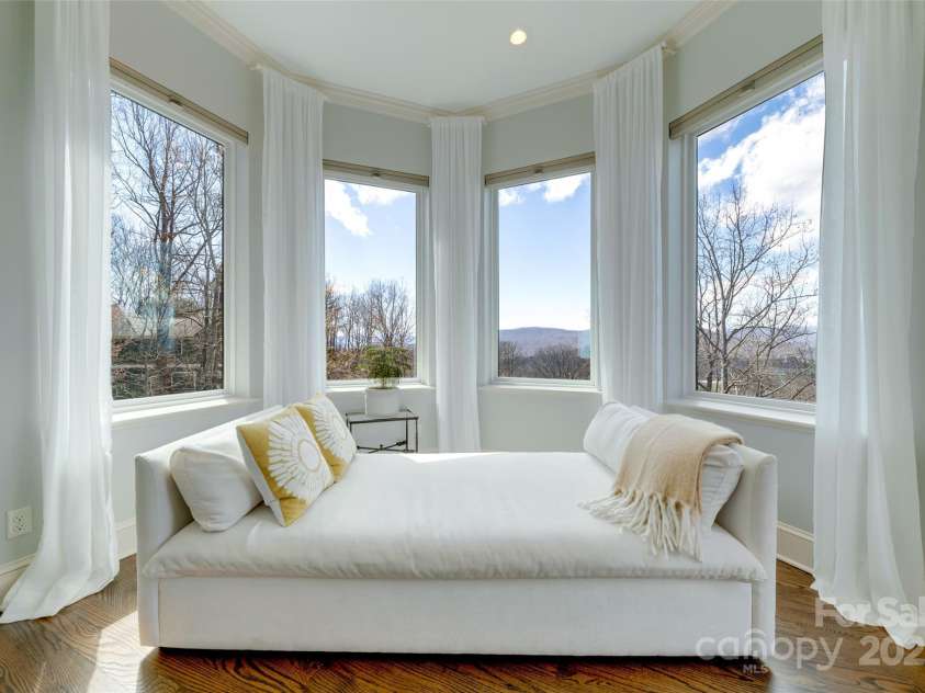 56 Chimney Crest Drive, Asheville, NC 28806.  MLS# CAR4235691, YatesRealty ID 12268. Sitting area in primary bedroom