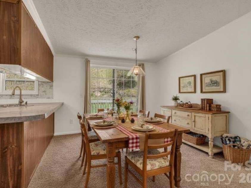 228 Vilas Overlook Drive, Vilas, NC 28692.  MLS# CAR4369701, YatesRealty ID 12269. Staged Dining Area
