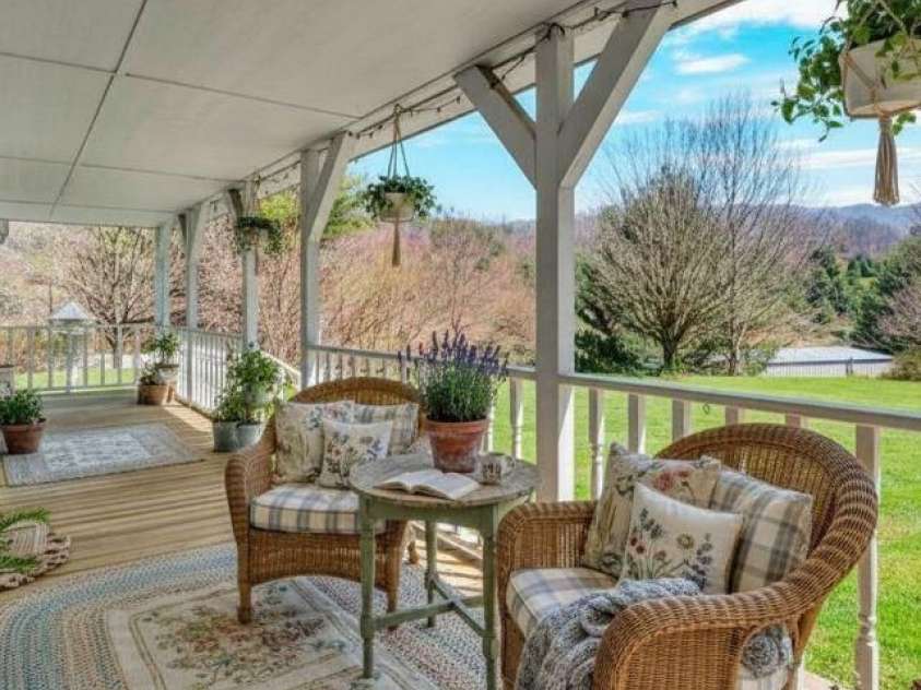 228 Vilas Overlook Drive, Vilas, NC 28692.  MLS# CAR4369701, YatesRealty ID 12269. Staged Front Porch