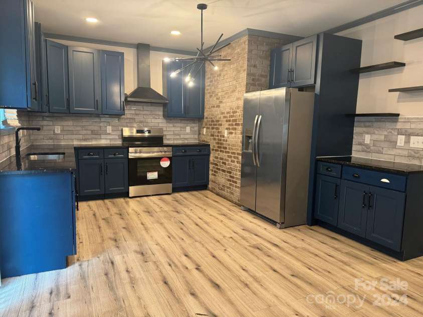 2216 Tate Street, Charlotte, NC 28216.  MLS# CAR4185695, YatesRealty ID 1227. 