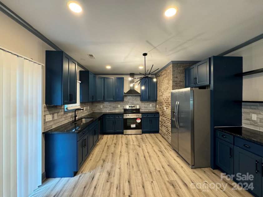 2216 Tate Street, Charlotte, NC 28216.  MLS# CAR4185695, YatesRealty ID 1227. 