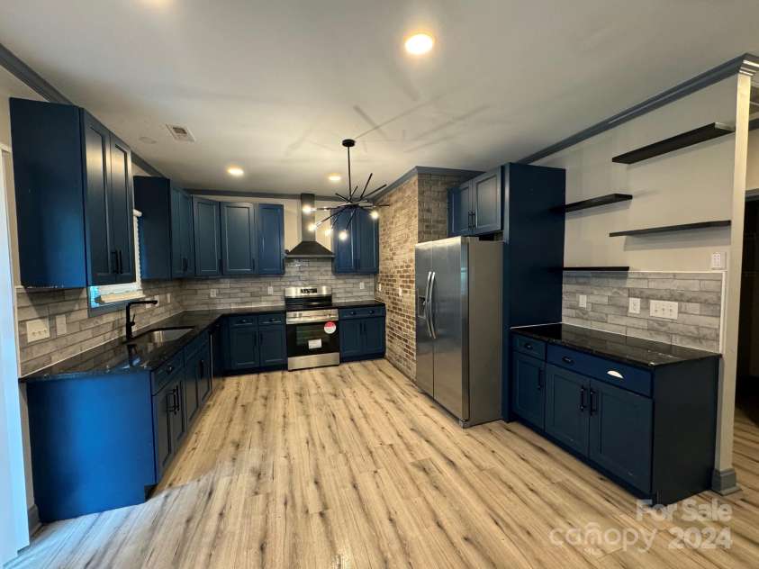 2216 Tate Street, Charlotte, NC 28216.  MLS# CAR4185695, YatesRealty ID 1227. 