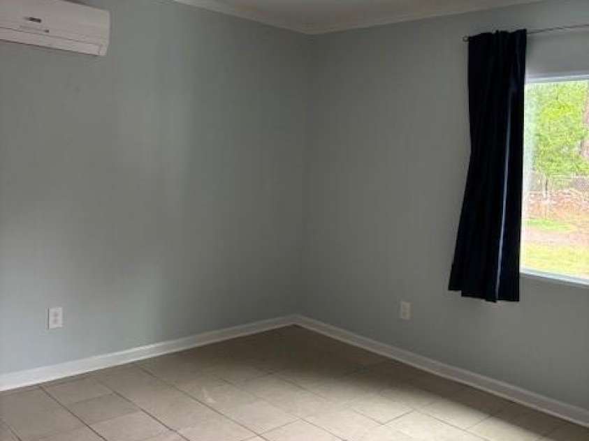 925 Grace Avenue, Lancaster, SC 29720.  MLS# CAR4254524, YatesRealty ID 12270. Apartment bedroom