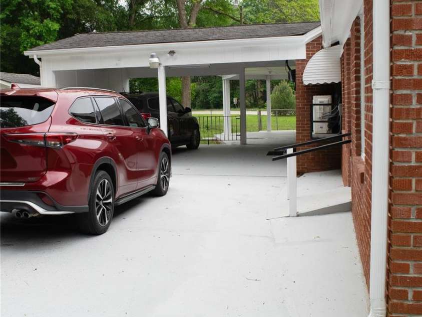 925 Grace Avenue, Lancaster, SC 29720.  MLS# CAR4254524, YatesRealty ID 12270. Carport/driveway