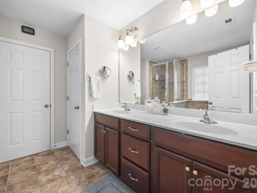 1206 Bottle Brush Lane, Harrisburg, NC 28075.  MLS# CAR4363111, YatesRealty ID 12273. Primary Bath