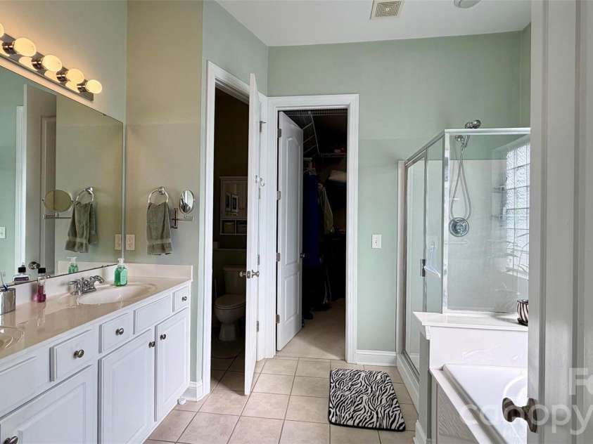 1104 Aringill Lane, Matthews, NC 28104.  MLS# CAR4354119, YatesRealty ID 12276. 