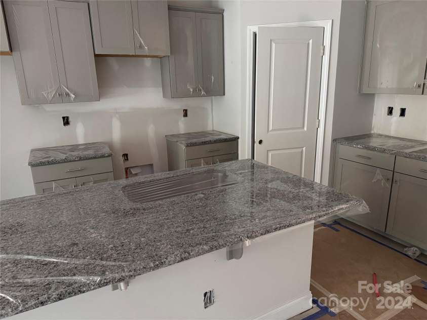 4057 Port Richmond Avenue, Gastonia, NC 28056.  MLS# CAR4192877, YatesRealty ID 12279. Kitchen Model 1514 Representation Photo