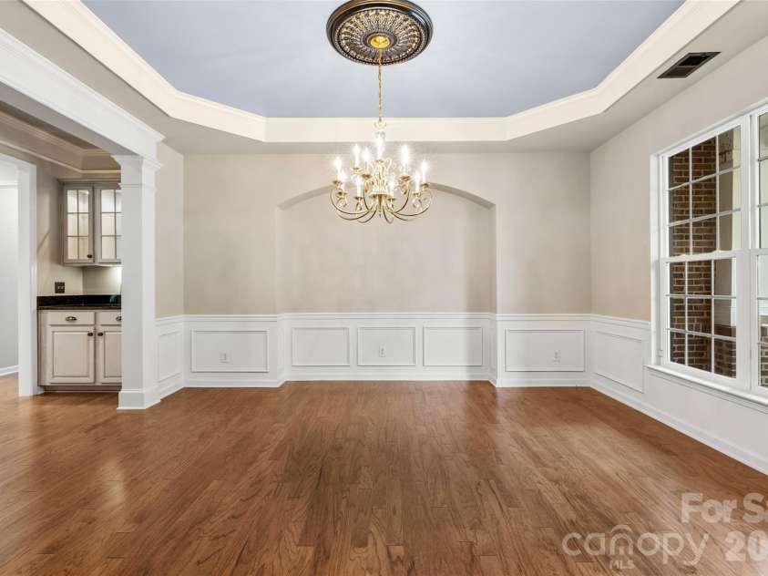 9332 Whistling Straits Drive, Fort Mill, SC 29707.  MLS# CAR4332758, YatesRealty ID 12280. Formal Dining Room w/ tray ceiling , Chandalier