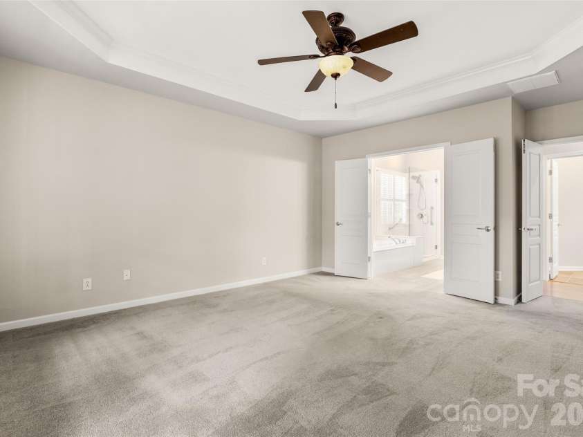 9332 Whistling Straits Drive, Fort Mill, SC 29707.  MLS# CAR4332758, YatesRealty ID 12280. Primary has en suite bath