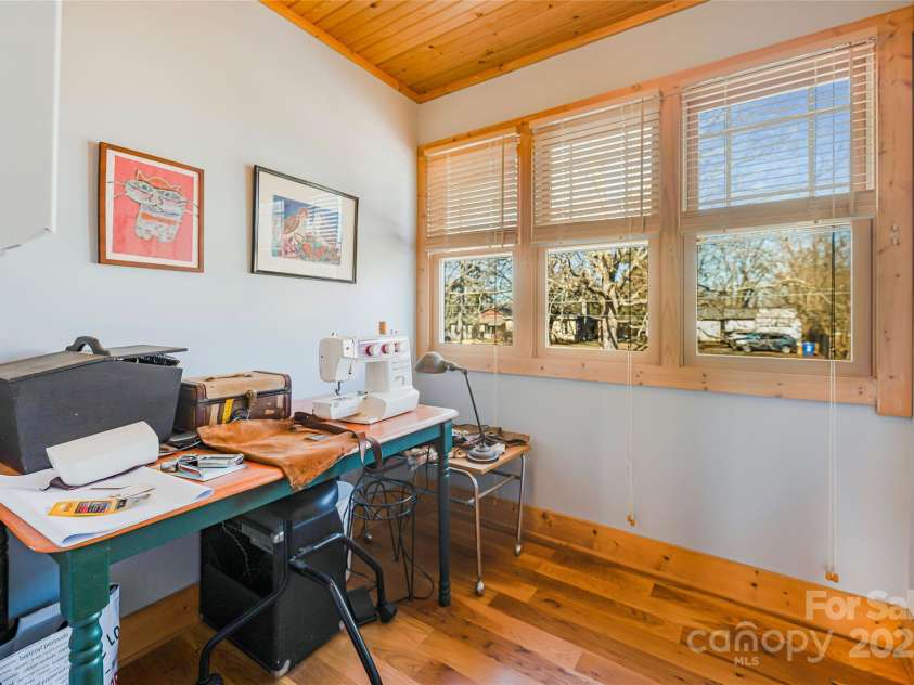 14 Drake Street, Asheville, NC 28806.  MLS# CAR4220997, YatesRealty ID 12283. Sewing room above the front porch.