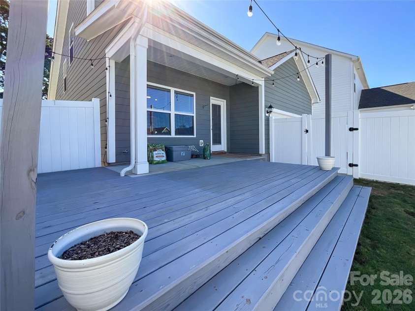 417 Kiser Lane, Locust, NC 28097.  MLS# CAR4312317, YatesRealty ID 12285. Rear View Extended Deck