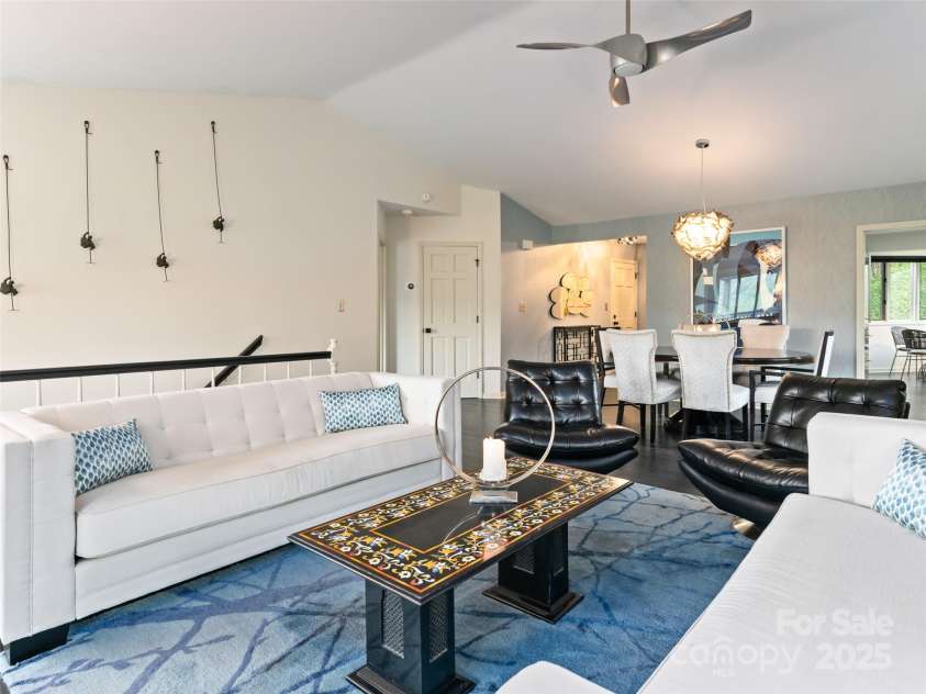 1901 Timber Trail, Asheville, NC 28804.  MLS# CAR4252207, YatesRealty ID 12288. Living Area with vaulted ceilings flows effortlessly in to the Dining Area, Kitchen and Foyer