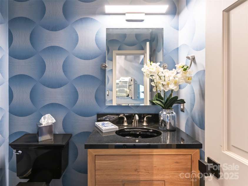 1901 Timber Trail, Asheville, NC 28804.  MLS# CAR4252207, YatesRealty ID 12288. Powder Room located off the Foyer adds a level of sophistication for guests and family