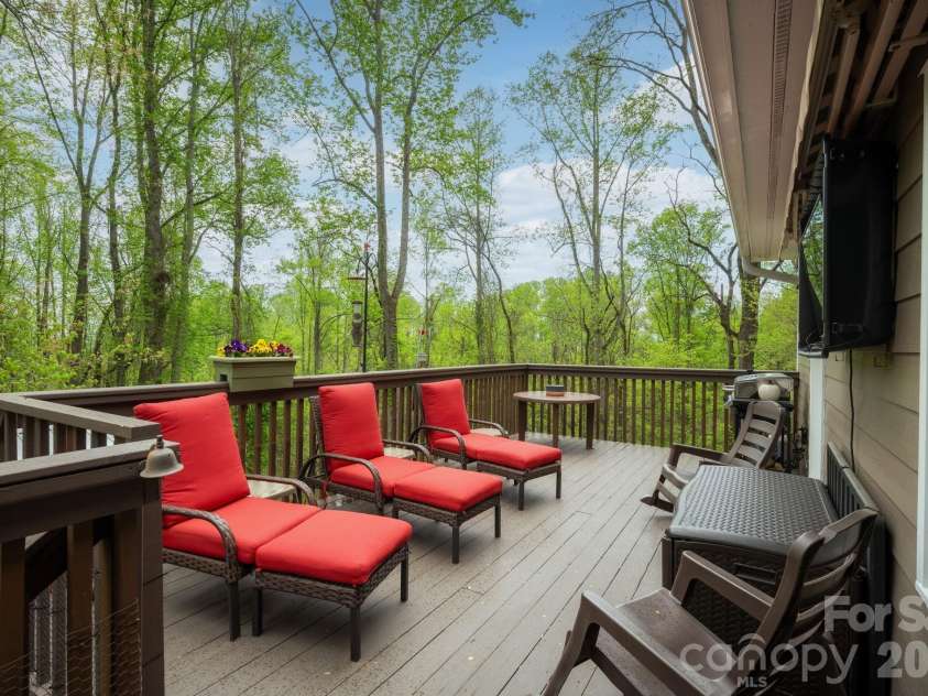 69 Heslar Way, Marshall, NC 28753.  MLS# CAR4345073, YatesRealty ID 12294. Spacious back deck
