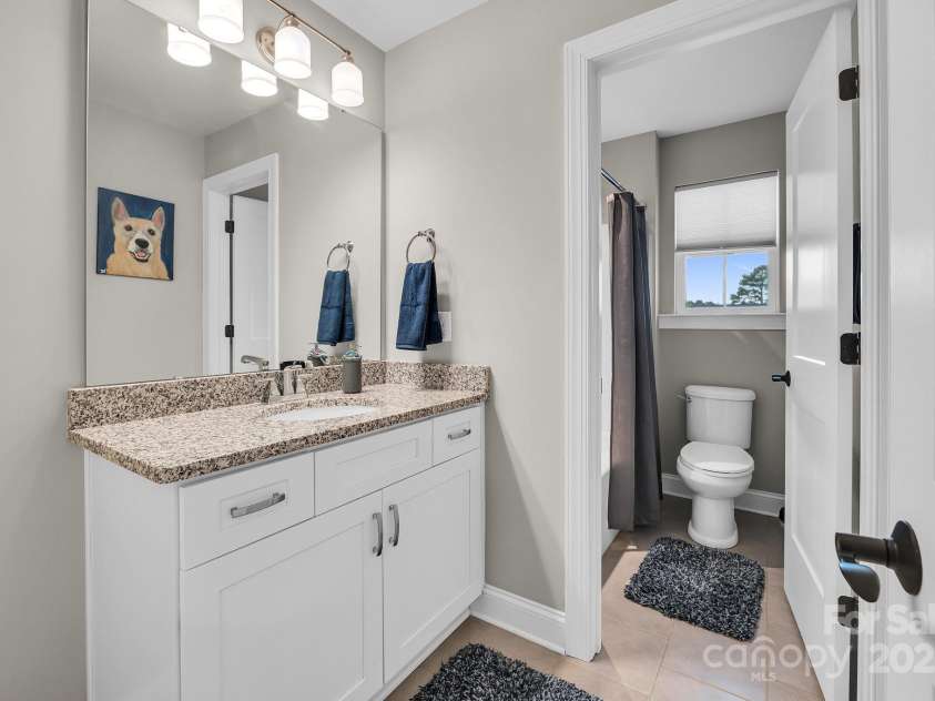 122 Round Rock Road, Troutman, NC 28166.  MLS# CAR4297796, YatesRealty ID 12298. Full Bathroom - Upper between Bedroom 2 and 3