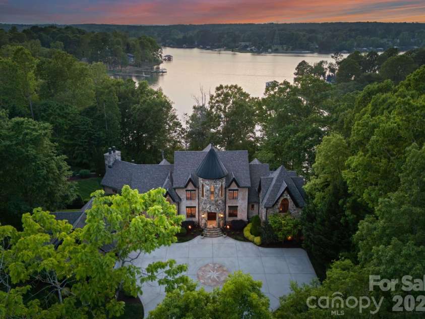 172 Tennessee Circle, Mooresville, NC 28117.  MLS# CAR4252701, YatesRealty ID 1230. Aerial view of the home featuring stunning views of Lake Norman. 