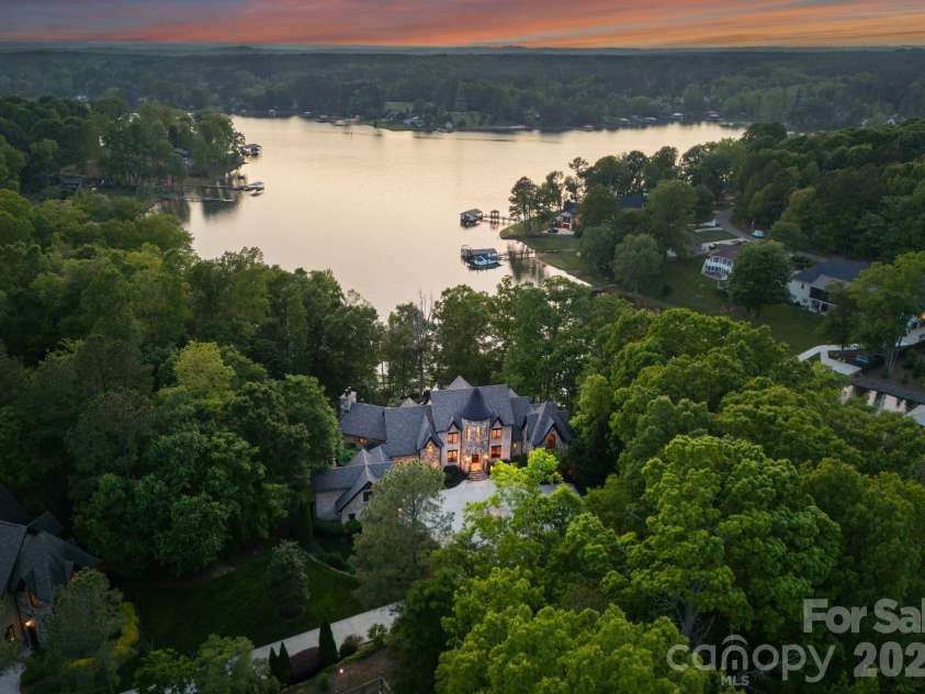 172 Tennessee Circle, Mooresville, NC 28117.  MLS# CAR4252701, YatesRealty ID 1230. Aerial view of the home featuring stunning views of Lake Norman. 